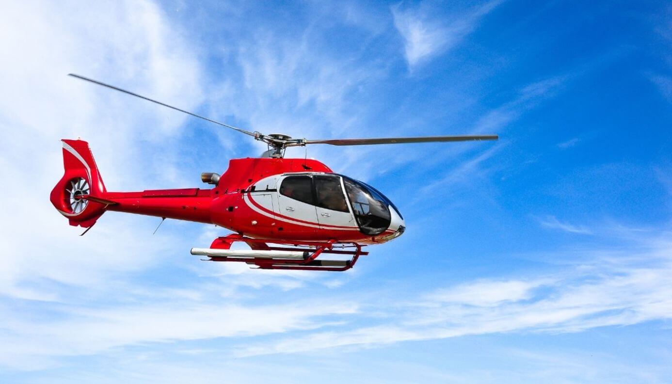 focus on what you can do - photo of a red helicopter against a blue sky